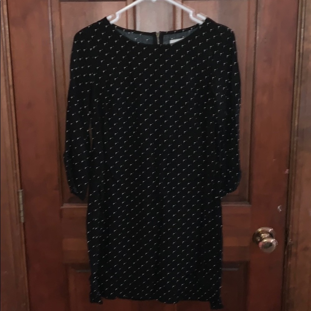 navy blue dress with white poka dots